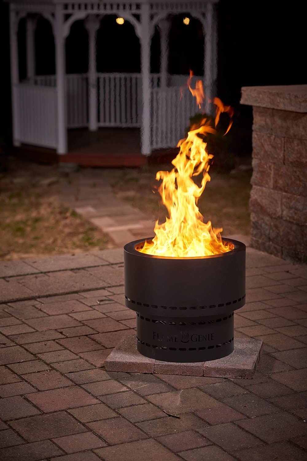 Flame Genie Portable Smoke-Free Inferno Wood Pellet Fire Pit Placed Outside with Fire