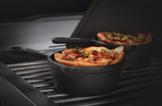 Napoleon Cast Iron Dessert Cooker on the Grill with Food