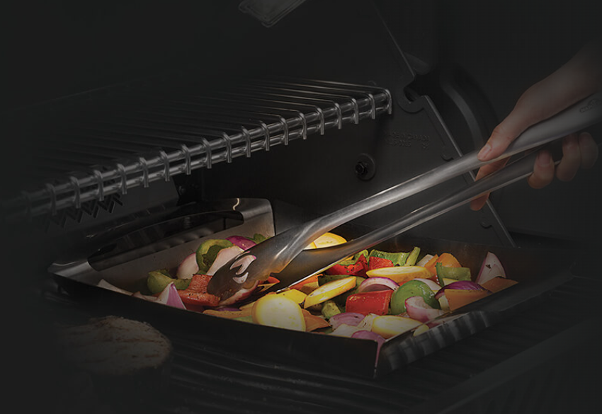 Napoleon Stainless Steel 2 Piece Toolset Tong on the Grill