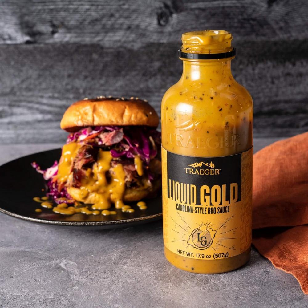 Traeger Liquid Gold BBQ Sauce Lifestyle with Hamburger