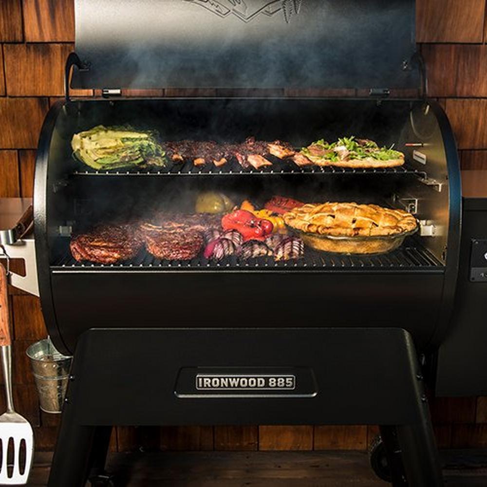Traeger Ironwood Series 885 Pellet Grill Front Opened with Foods Grill on it