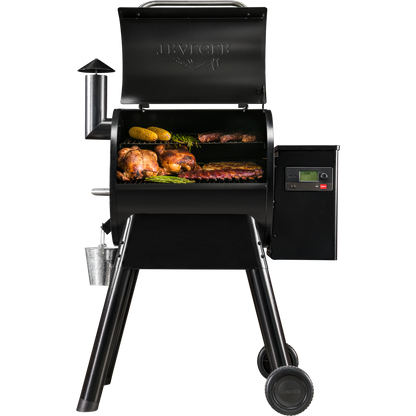 Traeger Pro 575 Black Wood Pellet Grill with Steaks and Chickens and Corns