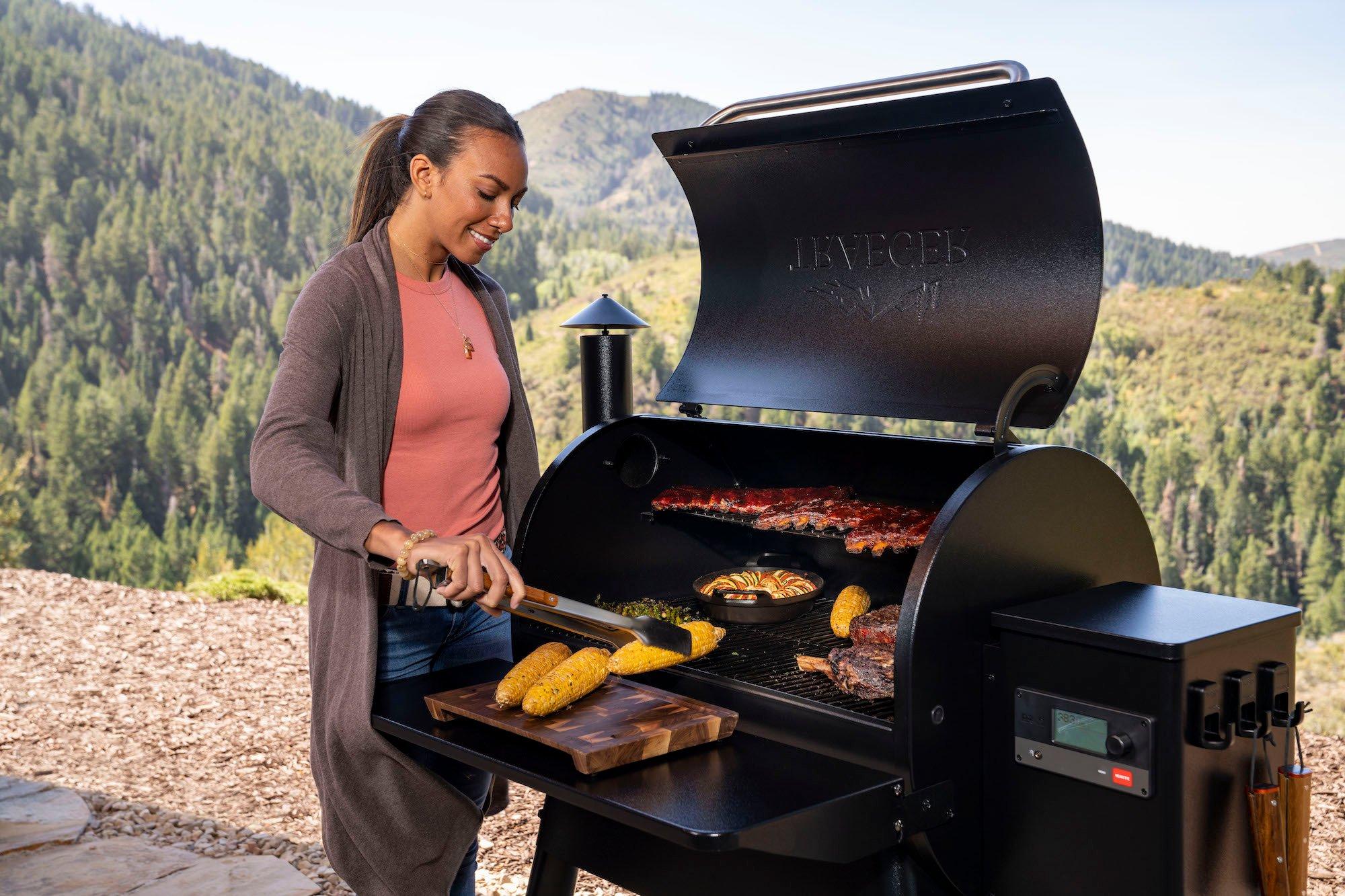 Traeger Pro 780 Black Wood Pellet Grill Lifestyle Cooking Corns and Steaks