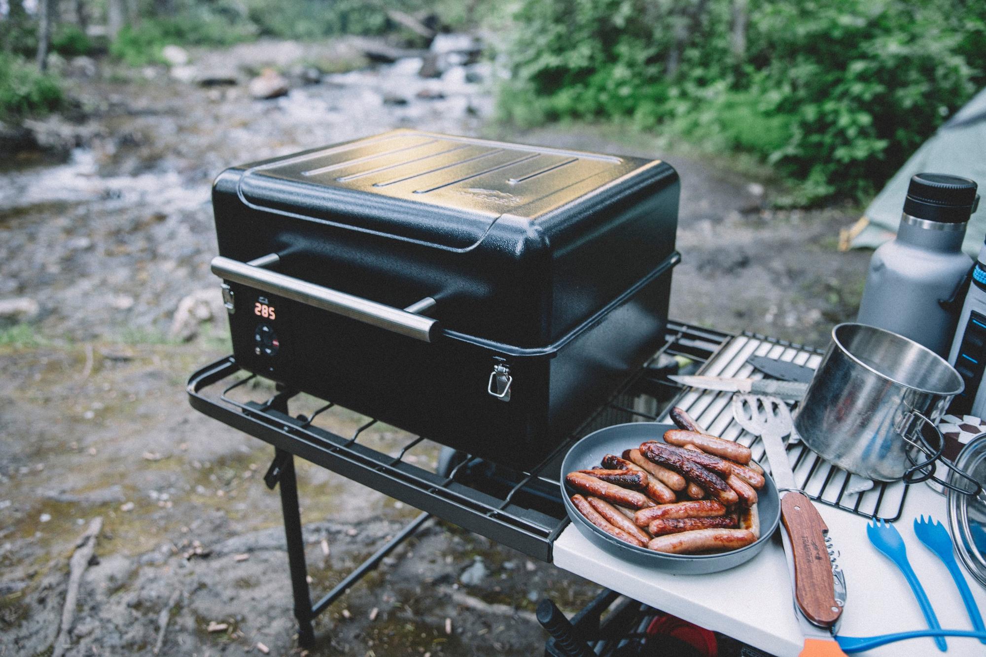 Traeger Ranger Portable Pellet Grill Lifestyle Camping with Sausages