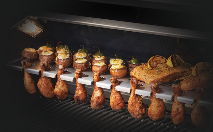 Napoleon Multifunctional Warming Rack on the Grill with Chicken Legs and Salmon