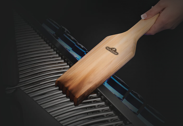 Napoleon Cedar Grip Scraper Used in Cleaning the Grill