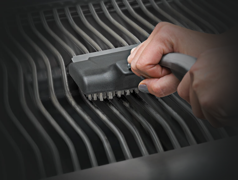 Napoleon Replacement Brush Head and Scrubber Cleaning the Grill