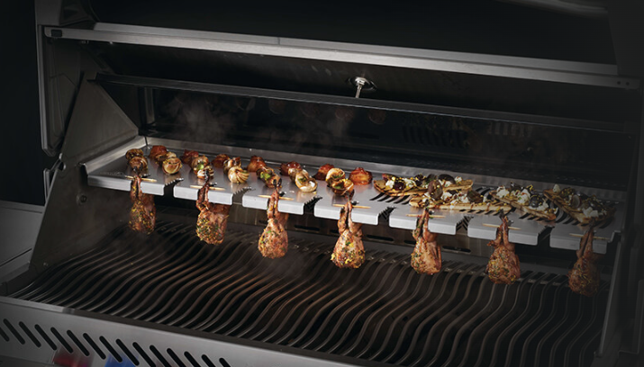Napoleon Multifunctional Warming Rack with Chicken on the Grill