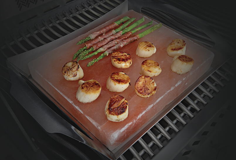 Napoleon Himalayan Salt Block with Stainless Steel Topper on the Grill with Asparagus