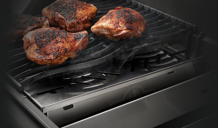 Napoleon Stainless Steel Smoker Box Placed on the Grill with Pork