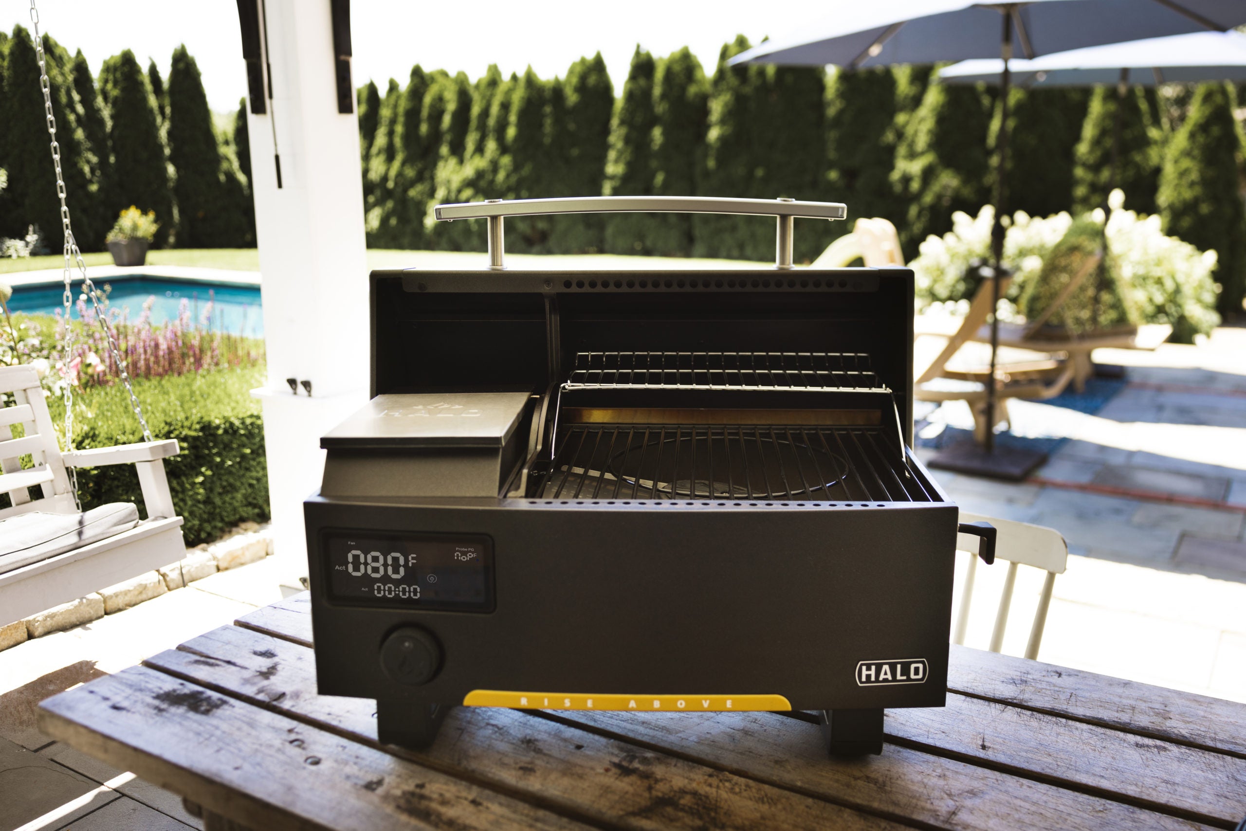 Halo Prime300 Countertop Pellet Grill Lifestyle on the Top of the Wood Table
