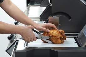 Napoleon Poultry Shears Cutting the Chicken
