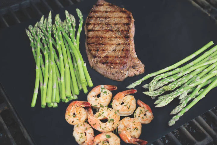 Bearpaw Non-Stick Mesh Grill Mat- 2 Pack on the Grill with Steak and Shrimps and Asparagus