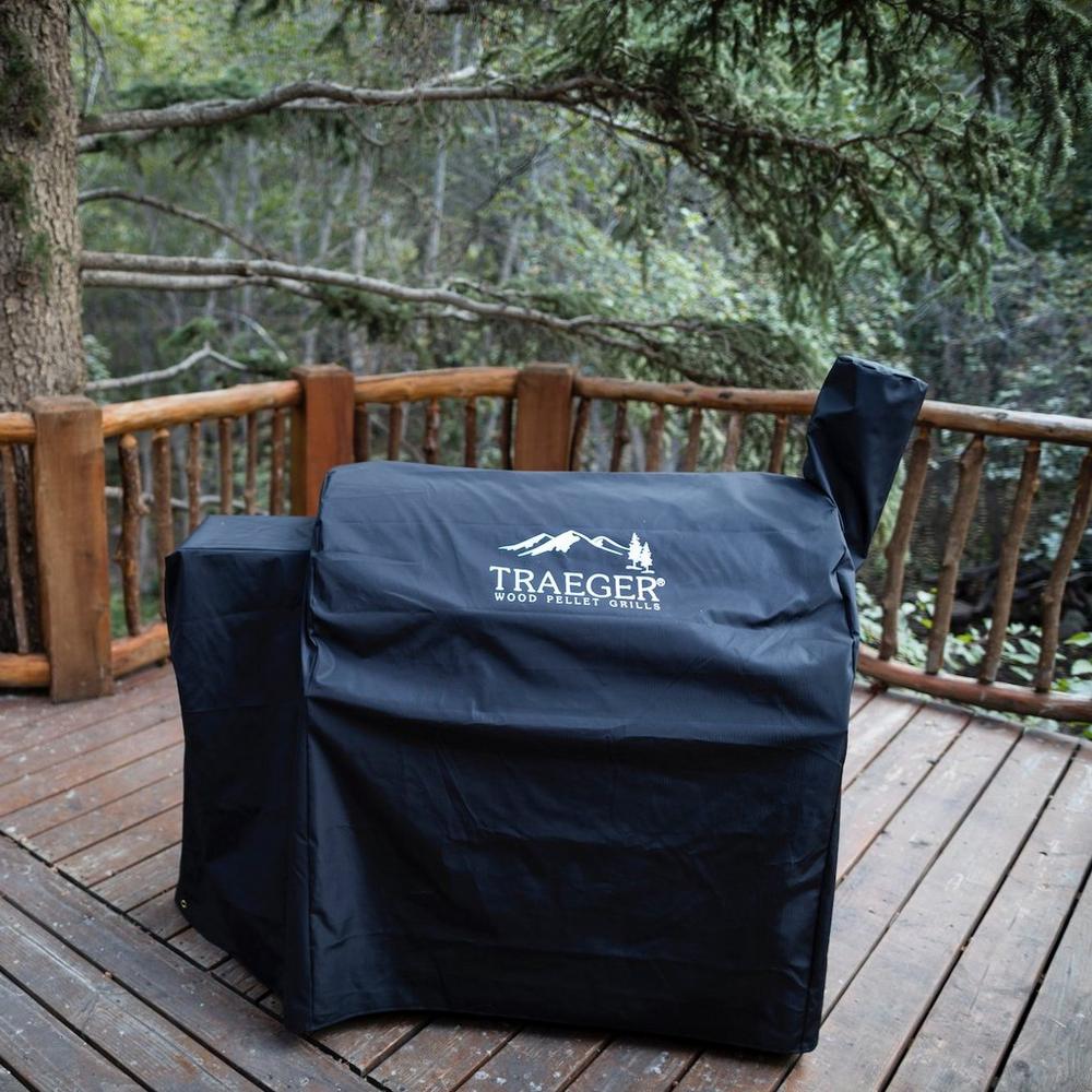 Traeger Pro 34 and Elite 34 Grill Cover Full Length  Lifestyle Placed on the Grill with Forest Background