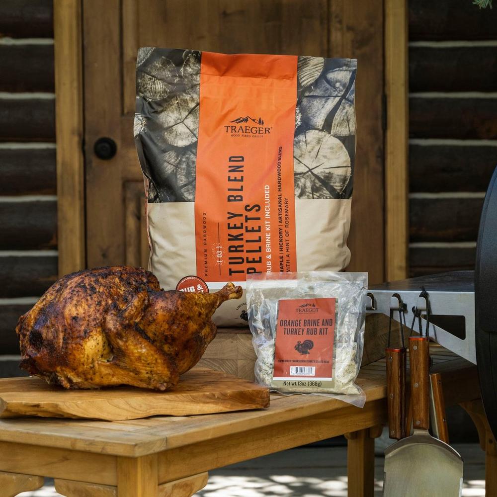 Traeger Turkey Blend Wood Pellets + Brine Kit with Chicken on the Table