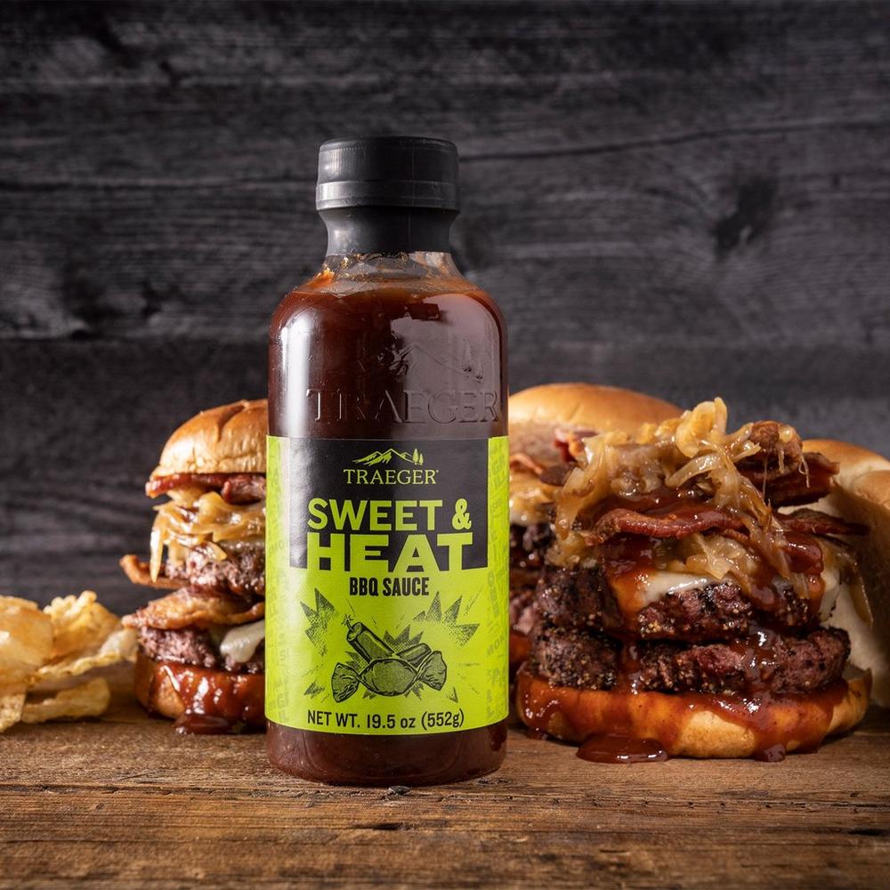Traeger Sweet and Heat BBQ Sauce Lifestyle with Burgers