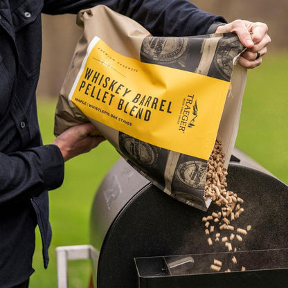 Traeger WhistlePig Whiskey Barrel Pellets Pouring it on the Grill